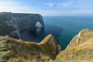 Stone arch on the coast, Etretat, Seine-Maritime Department, Atlantic Ocean, Normandy, France Stone arch on the coast, Etretat, Seine-Maritime Department, Atlantic Ocean, Normandy, France